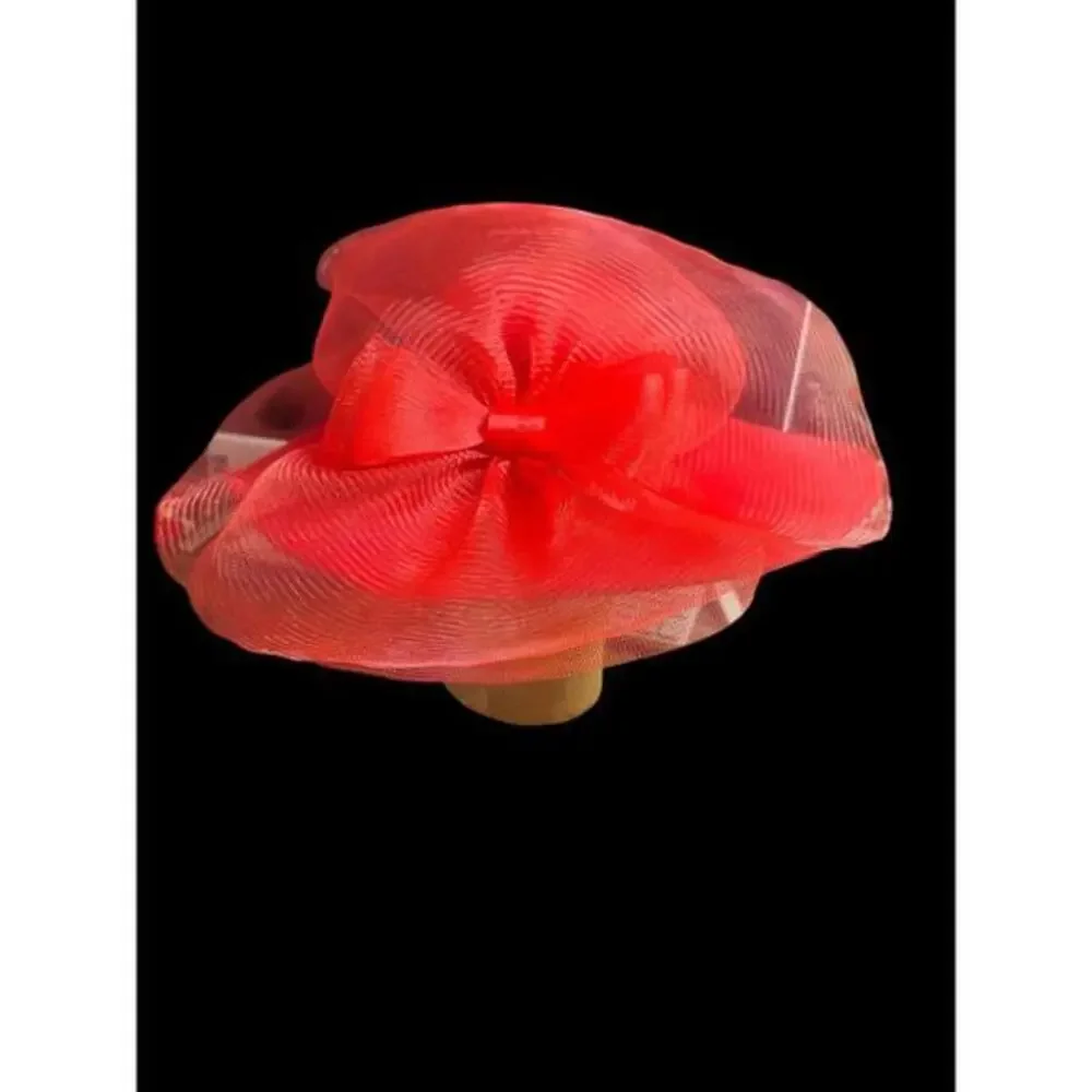 red wool wide brim hat dating to the glamorous 1980s. It has a low rounded crown